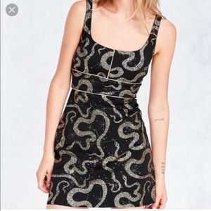 Urban Outfitters black and gold mini dress Medusa